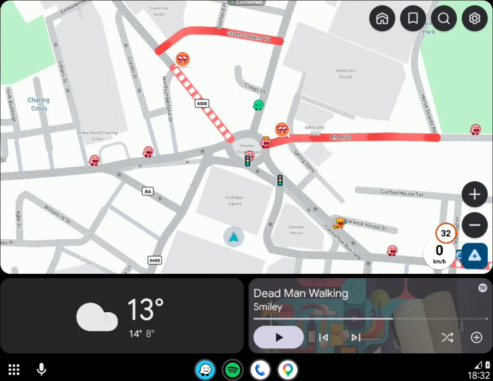 The Android Auto dashboard: Waze, the weather and a music card.